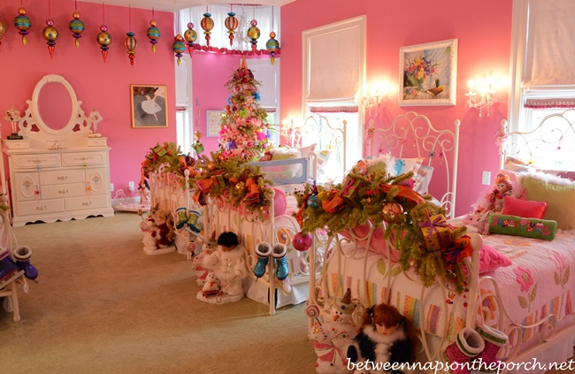 Pink girl's bedroom furnished with Pottery Barn furniture and ...
