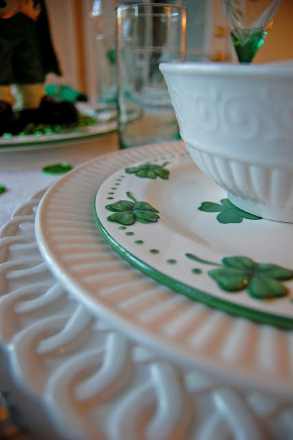 St. Patrick's Day Table Setting with Shamrock Plates and Leprechaun Centerpiece