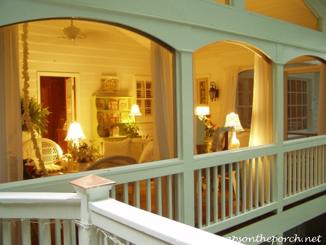 Screened Porch Lit Up with Lamplight