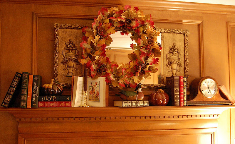 Decorate a fireplace mantel for Fall or Autumn with Books, Pumpkins and a fall wreath