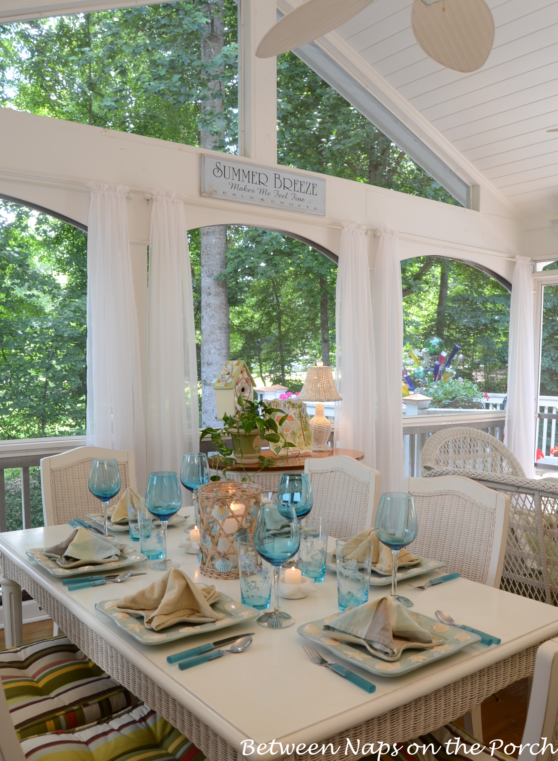 A Beach Themed Table Setting with a Starfish Napkin Fold