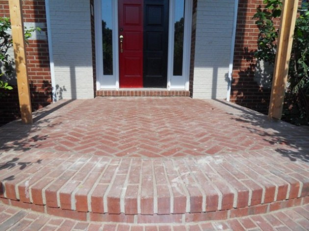 A Front Porch Renovation with Columns and a Herringbone Brick Floor