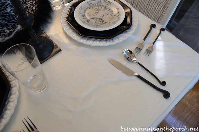 Halloween Tablescape with Spider Cupcakes, Clock Plates & a Witch's Hat Centerpiece