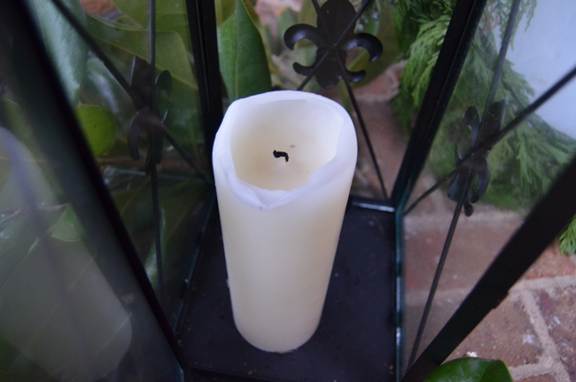 Candle on Christmas Porch