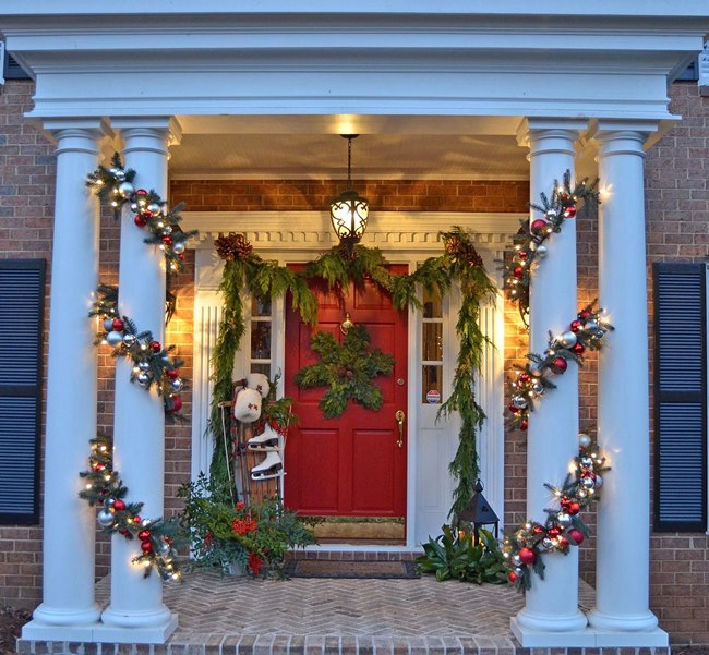 Christmas Porch with Snowflake Wreath and Lit Garland