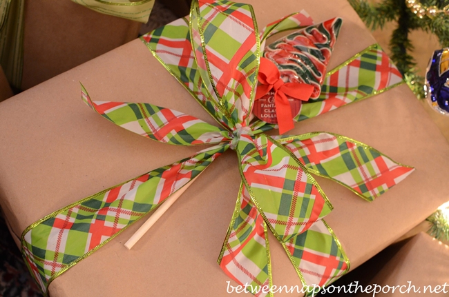Christmas Presents Wrapped in Craft Paper and Colorful Ribbons