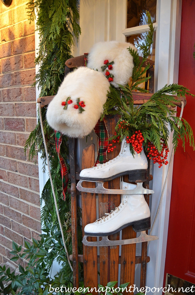 Decorating the Porch for Christmas with Natural Garland. Sled, Ice ...