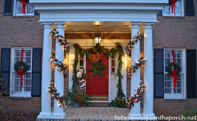 Decorating the Porch for Christmas with Garland, Sled, Ice Skates, Muff and Snowflake Wreath