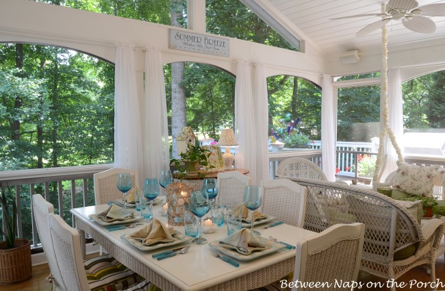 Beach Themed Table Setting Tablescape with Starfish Napkin Fold and Beach Dishware