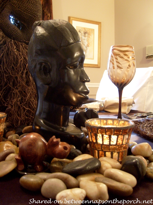 Carved Wood Hippo and River Rock in African Safari Table Setting