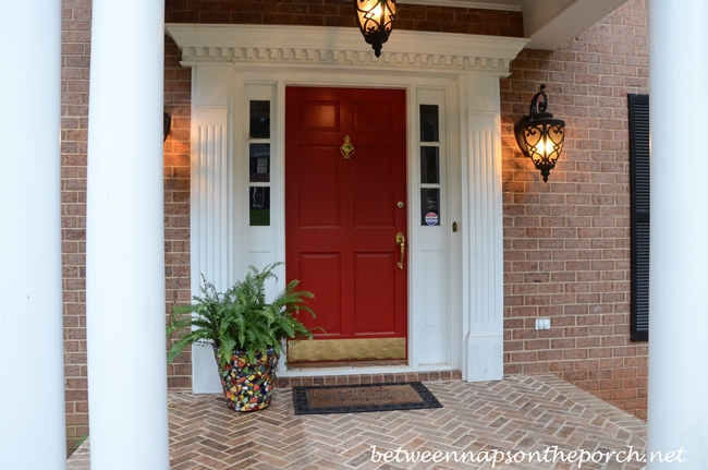 Red front door painted in Benjamin Moore, Heritage Red