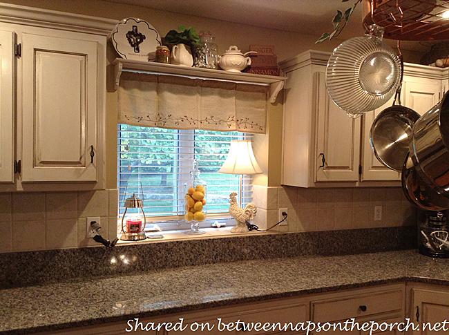 Kitchen Renovated with Painted Cabinets and Granite