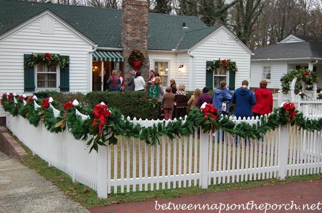 Picket Fence Decorated with Garland for Christmas_wm