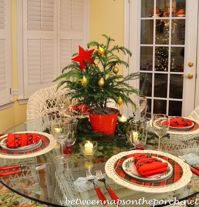 Christmas Table Setting with a Christmas Tree Napkin Fold