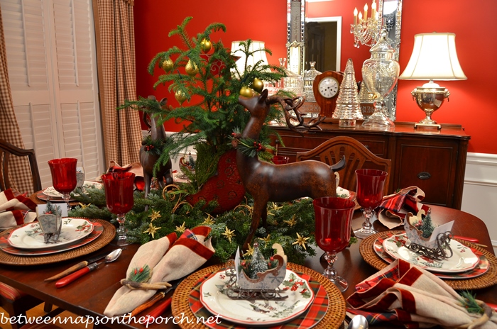 Christmas Tablescape Table Setting with Plaid Plates and Deer Centerpiece