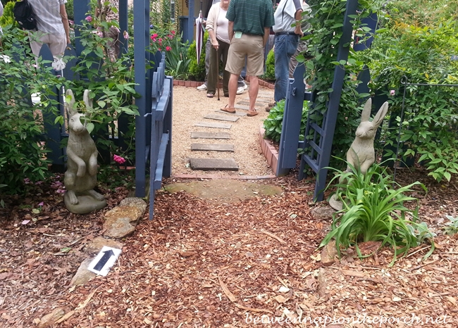 Bunnies Framing Arbor Entrance To Garden_wm