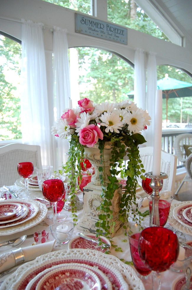 Floral Centerpiece of Roses and Daisies