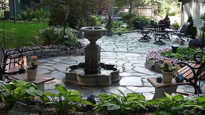 Backyard Makeover, Pond Become Flagstone Patio With Fountain