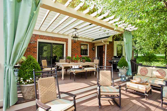 Deck with pergola and outdoor curtains