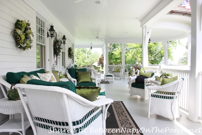 Victorian Porch With White Wicker Furniture