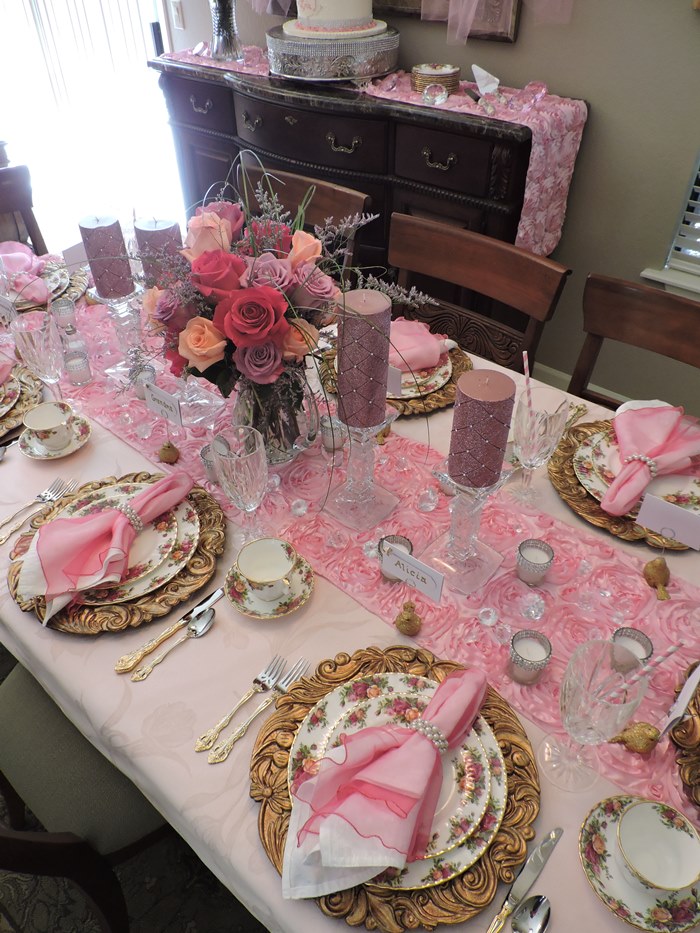 Pink and gold baby shower sales table setting