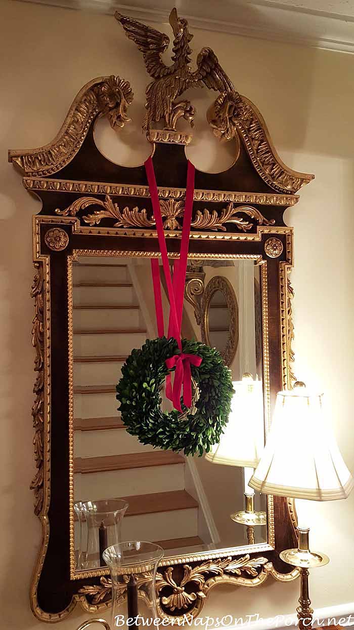 Boxwood Wreath Hanging From Mirror