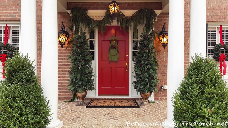 Christmas Porch with Red Door and Cedar Garland