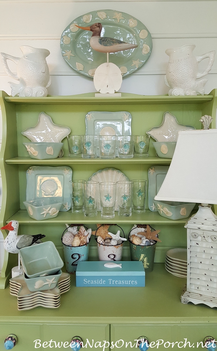 Screened Porch Hutch with Nautical Themed Dishware