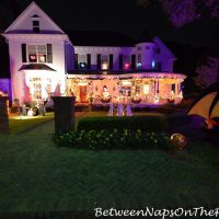 victorian-home-lit-at-night-for-halloween