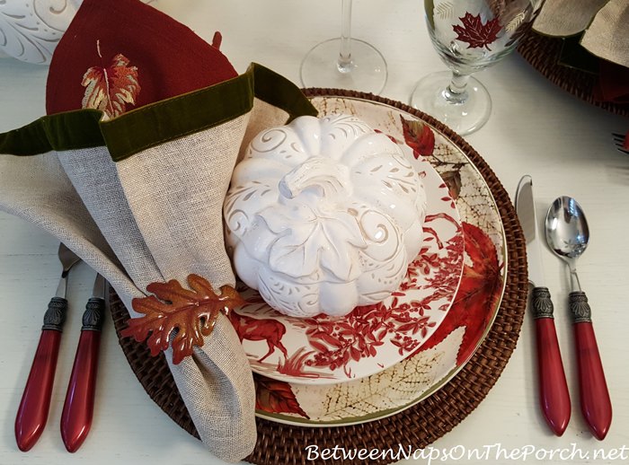 A Fall Table with Pumpkin Soup Tureens and Autumn Leaf Dinnerware