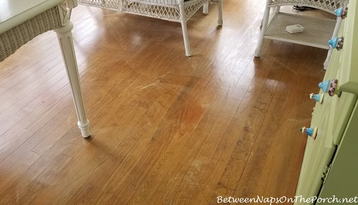 Sweeping Up Pollen Before Mopping Porch Floor