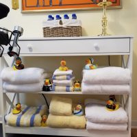 Whimsical Linen Storage with Rubber Ducks, Duckies