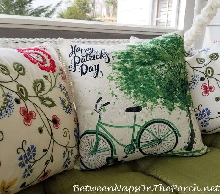 Happy St. Patrick's Day Pillow on Porch Swing