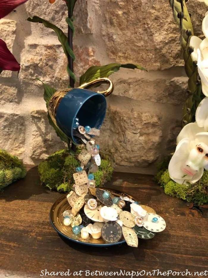 Build a floating tea cup centerpiece - Alice in Wonderland DIY 
