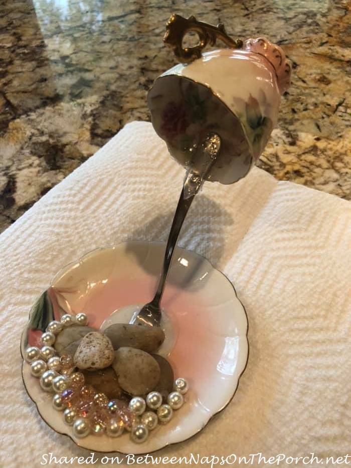 Espresso teacup with fork with stone and bead weights