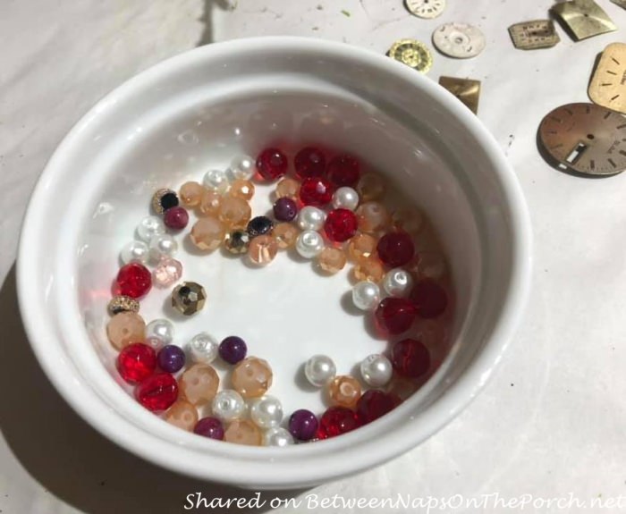 https://betweennapsontheporch.net/wp-content/uploads/2021/04/Floating-Teacup-Tutorial-beads-for-Old-Country-Roses-teacup.jpg