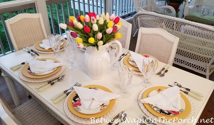 https://betweennapsontheporch.net/wp-content/uploads/2021/04/Spring-Table-Setting-Tulip-Centerpiece-Butterfly-Napkin-Fold.jpg