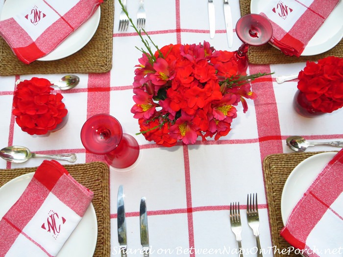 Red Floral Centerpiece for a Red, White Table Setting