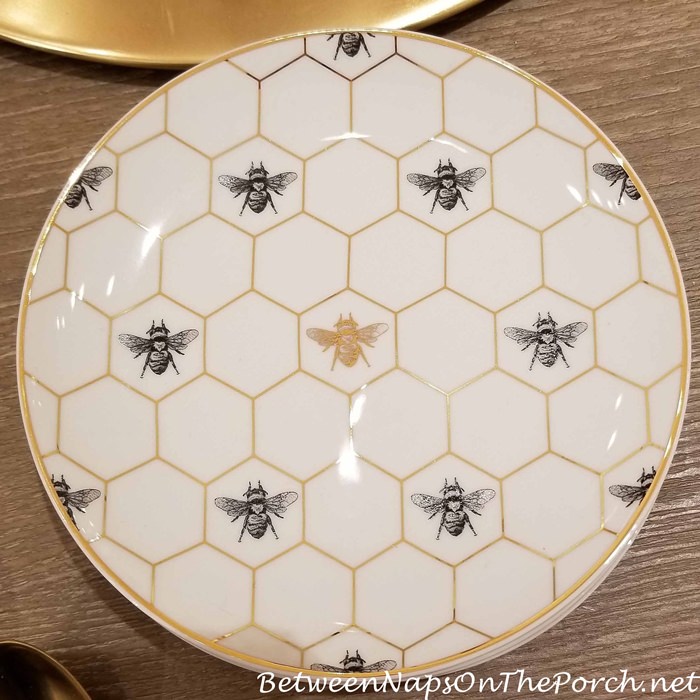 https://betweennapsontheporch.net/wp-content/uploads/2022/01/Bee-Plates-Gold-and-Black.jpg