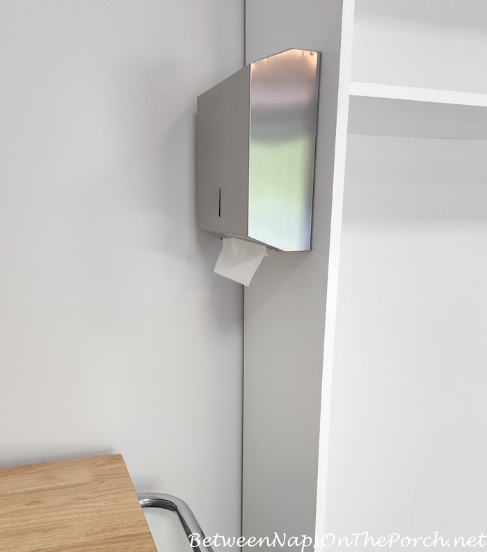 Cabinet-mounted paper towel holder