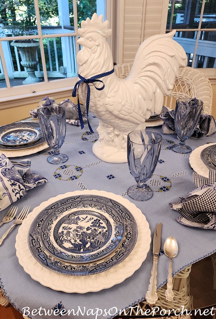 White Rooster Centerpiece in a Blue and White Table
