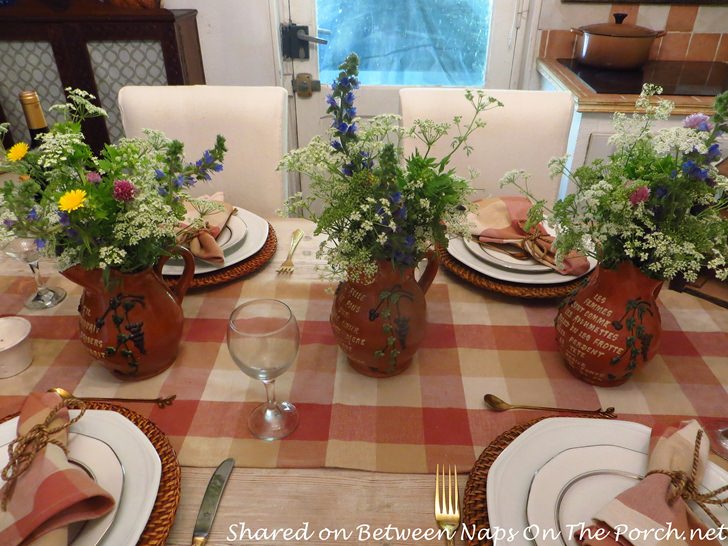Floral Centerpieces in French Pitchers
