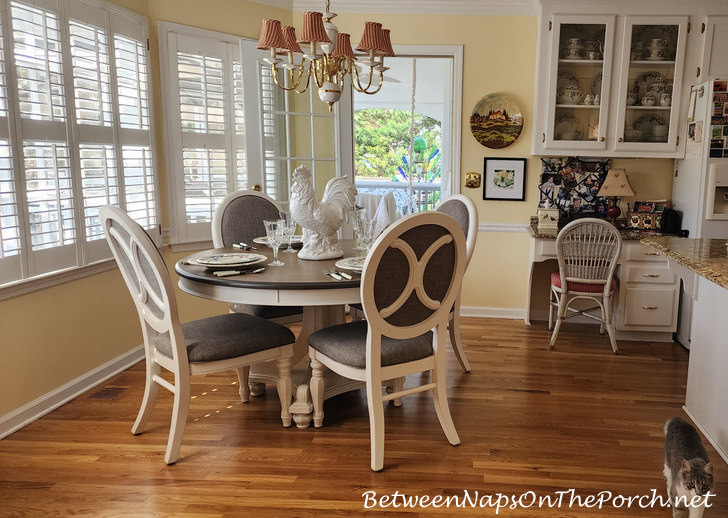 French Market Round Dining Room with Upholstered Chairs