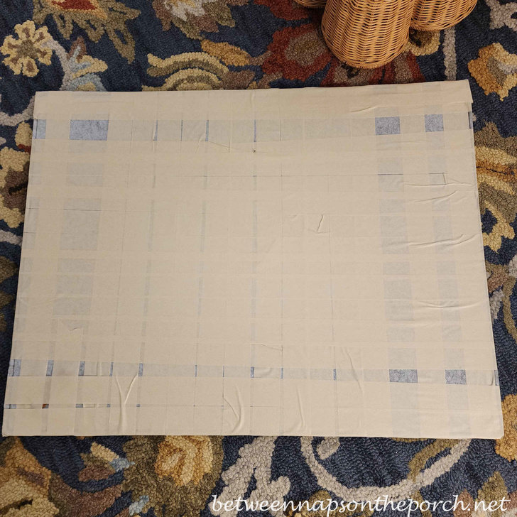 Masking tape used to flip a puzzle for framing, preserving