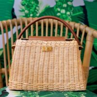 Wicker Bag looks very similar to Louis Vuitton Capucines Wicker Bag