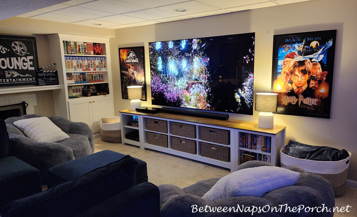 Home Movie Room with Lamps on alongside TV