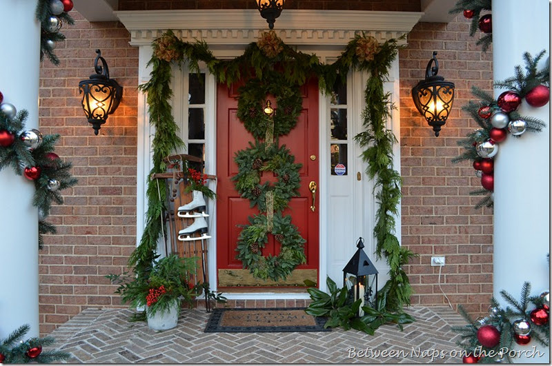 Front Porch Decorated for Christmas with Three Wreaths on Door and ...