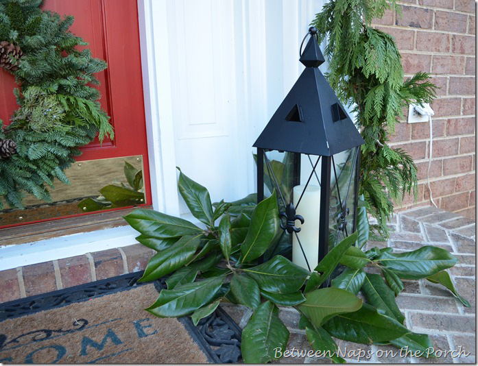 Front Porch Decorated for Christmas with Triple Wreaths on Door and Pottery Barn Knock-off Garland