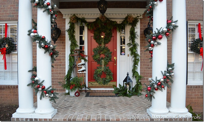 Christmas Porch With Triple Wreaths Between Naps On The Porch